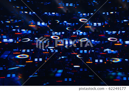 DJ mixer in a nightclub with a background of glowing lights from buttons DJ mixer in a nightclub with a background of glowing lights from buttons 62249177