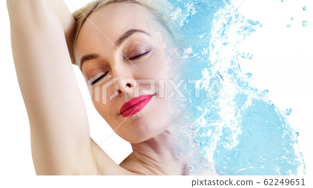 Sensual adult woman with fresh skin and water splash. Sensual adult woman with fresh skin and water splash. 62249651