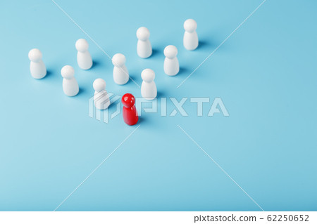 The leader in red leads a group of white employees The leader in red leads a group of white employees 62250652