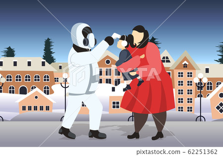 man in hazmat suit checking temperature of mother and daughter walking outdoor coronavirus infection epidemic MERS-CoV virus wuhan 2019-nCoV pandemic health risk concept full length horizontal 62251362
