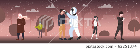 man in hazmat suit checking temperature of people walking outdoor spreading coronavirus infection epidemic MERS-CoV virus wuhan 2019-nCoV pandemic health risk concept full length horizontal 62251374