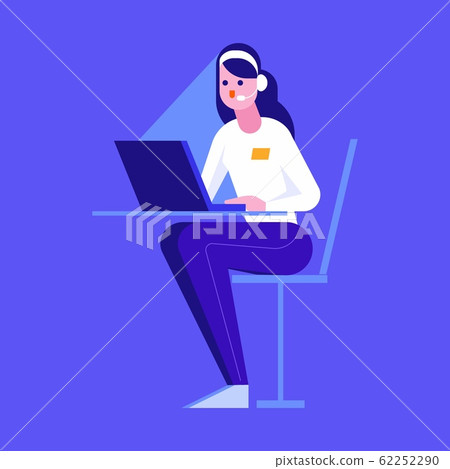 Woman with headset on her head sitting on a chair at the table and working on the notebook. 62252290