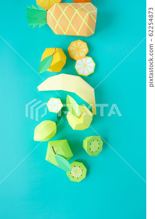 Different exotic fruits made of paper on trendy 62254873