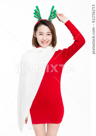 studio shot of young woman wearing reindeer 62256253