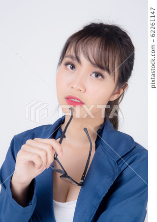 Beautiful portrait young asian business woman wearing glasses expression thinking isolated 62261147