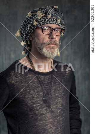 Old fashion man, good looking. Egyptian scarf and glasses 62261395