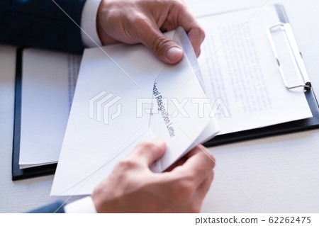 Businessman has stress to resignation and signing Businessman has stress to resignation and signing 62262475