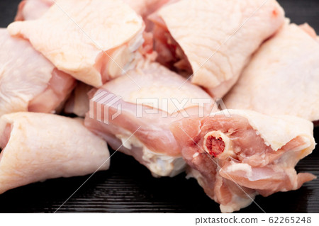 Chopped chicken on a black tray Chopped chicken on a black tray 62265248