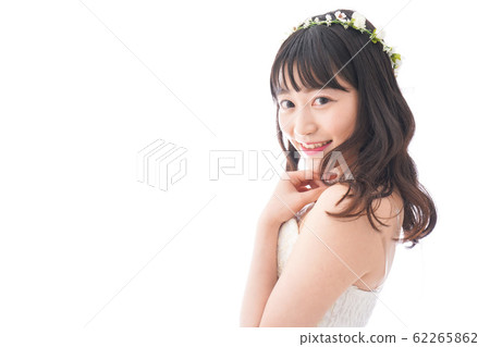 A smiling bride wearing a dress A smiling bride wearing a dress 62265862