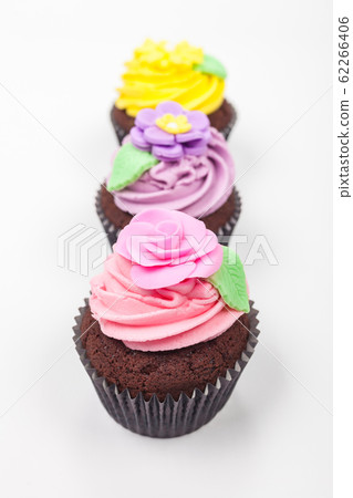 Cupcakes With Colorful Icing or Frosting 62266406