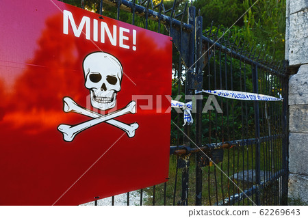 Beware of mines sign on closed territory Beware of mines sign on closed territory 62269643