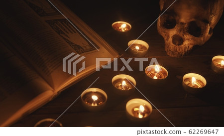 Altar with magical grimoire closeup photo 62269647