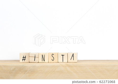Wooden cubes with a hashtag and the word instagram, social media concept background 62271068