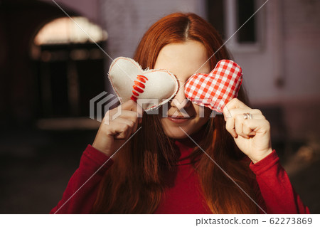 Valentine's Day. Pretty girl with heart symbols Valentine's Day. Pretty girl with heart symbols 62273869