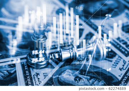 Chess game on chess board behind business man 62274889