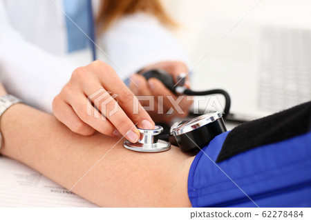 Female doctor arms make medic procedure closeup 62278484