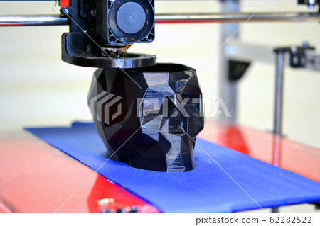 Abstract object of a black color printed by 3d printer. Abstract object of a black color printed by 3d printer. 62282522