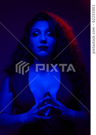 Young woman with closed eyes in studio Young woman with closed eyes in studio 62283801