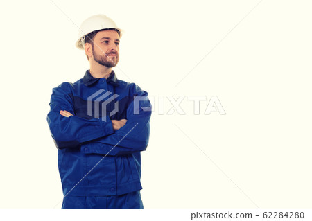 Handsome young man with protective helmet on his 62284280