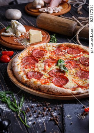 Composition of sausage pizza and ingredients for Composition of sausage pizza and ingredients for 62287553