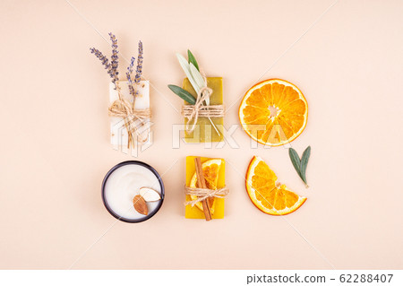 Three pieces of soap and cream. Three pieces of soap and cream. 62288407