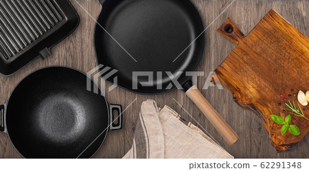 Empty cast iron frying pan. Empty cast iron frying pan. 62291348