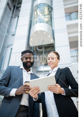 Analyzing report with colleague Analyzing report with colleague 62291446