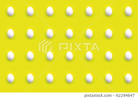 Pattern of white eggs on a yellow background 62294647
