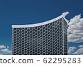 A vaulted big building with a honeycomb facade 62295283