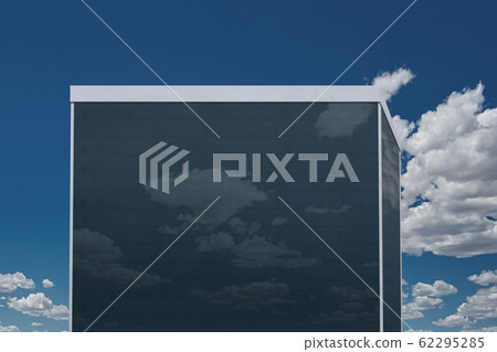 Reflection of the clouds in the high-rise building 62295285