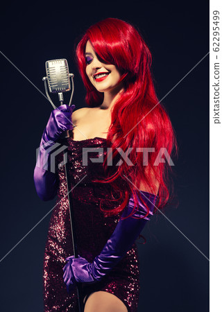 Young smile redhead woman with very long hair in 62295499