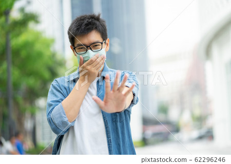 HandsomeMan wearing face mask protect filter 62296246