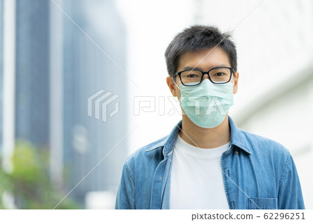 HandsomeMan wearing face mask protect filter 62296251