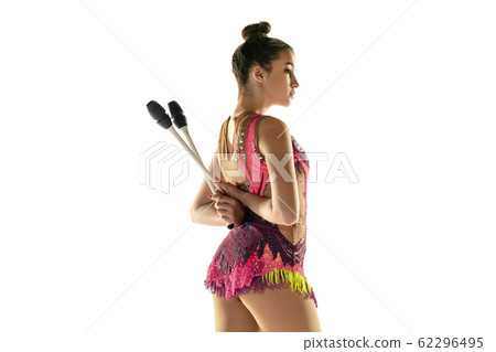 Young flexible female gymnast isolated on white studio background Young flexible female gymnast isolated on white studio background 62296495