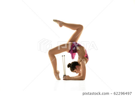 Young flexible female gymnast isolated on white studio background 62296497