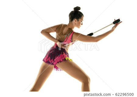 Young flexible female gymnast isolated on white studio background Young flexible female gymnast isolated on white studio background 62296500