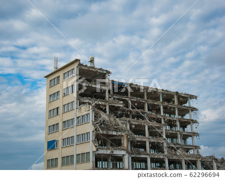 The demolition of a multi-storey office building The demolition of a multi-storey office building 62296694