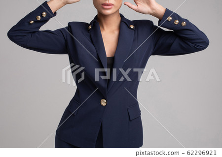 Attractive elegant woman in black office suit and 62296921