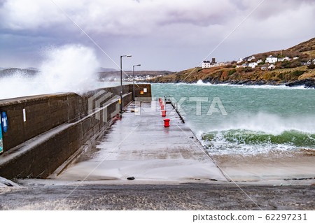 Crashing ocean waves in Portnoo during storm Ciara in County Donegal - Ireland 62297231