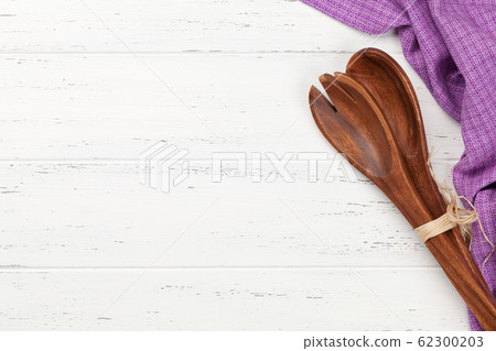 Kitchen table with utensils and tablecloth Kitchen table with utensils and tablecloth 62300203