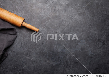 Rolling pin on kitchen table 62300212