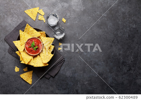 Mexican nachos chips and tequila 62300489