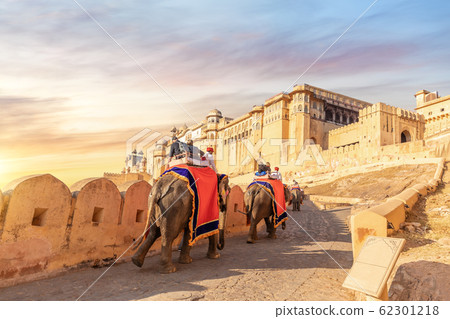 Tourists on the elephants in Amber Fort, Jaipur, Rajasthan, India Tourists on the elephants in Amber Fort, Jaipur, Rajasthan, India 62301218