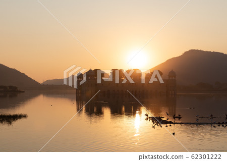 Jal Mahal Palace in the Man Sagar Lake, sunrise silhouette, Jaipur, India Jal Mahal Palace in the Man Sagar Lake, sunrise silhouette, Jaipur, India 62301222