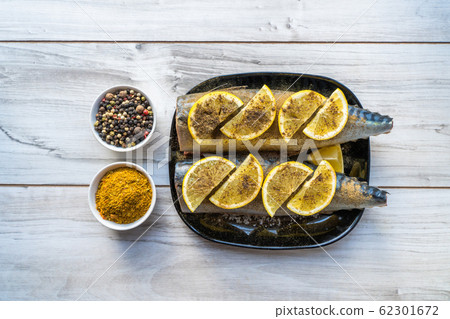 Fresh raw pickled mackerel ready to bake 62301672