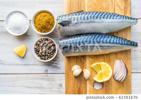 Fresh raw mackerel fish with cooking ingridients Fresh raw mackerel fish with cooking ingridients 62301676