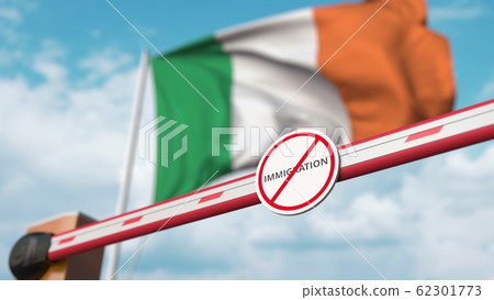 Closed boom gate with no immigration sign on the Irish flag background. Border closure or immigration ban in Ireland. 3D rendering Closed boom gate with no immigration sign on the Irish flag background. Border closure or immigration ban in Ireland. 3D rendering 62301773