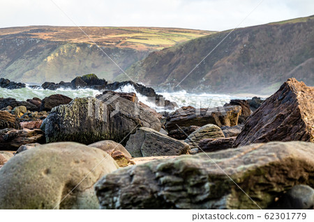 Kinnagoe bay in County Donegal, Inishowen has an extraordinary selection of colourful stones- Ireland Kinnagoe bay in County Donegal, Inishowen has an extraordinary selection of colourful stones- Ireland 62301779
