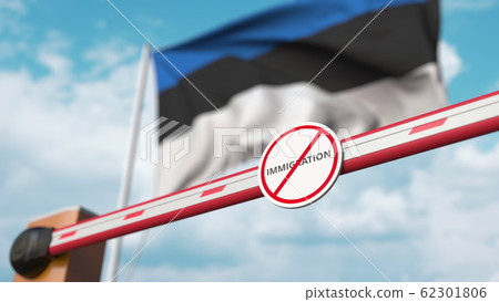 Closed boom barrier with stop immigration sign against the Estonian flag. Border closure or immigration ban in Estonia. 3D rendering 62301806
