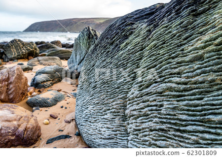 Kinnagoe bay in County Donegal, Inishowen has an extraordinary selection of colourful stones- Ireland Kinnagoe bay in County Donegal, Inishowen has an extraordinary selection of colourful stones- Ireland 62301809
